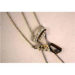 A WHITE GOLD CHAIN HAVING OLD MINE CUT DIAMOND DROP