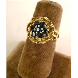 A 14K YELLOW GOLD AND SAPPHIRE FLORA-FORM RING