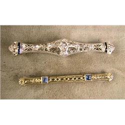A WHITE GOLD AND DIAMOND FILIGREE BAR PIN