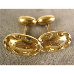 A PAIR OF GOLD OVAL FACED CUFFLINKS