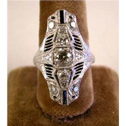 A WHITE GOLD AND DIAMOND OVAL RING