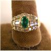 Image 1 : A YELLOW GOLD, EMERALD AND DIAMOND RING