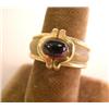 Image 1 : A YELLOW GOLD, AND CABOCHON GARNET RING