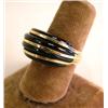 Image 1 : A YELLOW GOLD, AND ONYX DOME RING