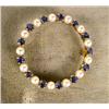 Image 1 : A TIFFANY & CO YELLOW GOLD PEARL AND SAPPHIRE CIRCLE PIN