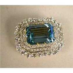 A TIFFANY & CO 18 K YELLOW GOLD PLATINUM DIAMOND AND AQUAMARINE BROOCH