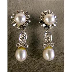 A PAIR OF WHITE GOLD DIAMOND AND PEARL EARRINGS