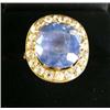 Image 1 : A 14K YELLOW GOLD DIAMOND AND TANZANITE RING