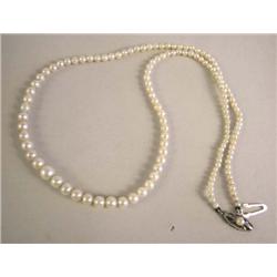 A MIKIMOTO GRADUATED PEARL NECKLACE
