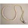 Image 1 : A MIKIMOTO GRADUATED PEARL NECKLACE