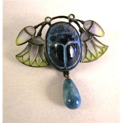 AN ART NOUVEAU PLIQUE-A-JOUR STERLING SILVER WITH CARVED LAPIS LAZULI SCARAB CENTER BROOCH