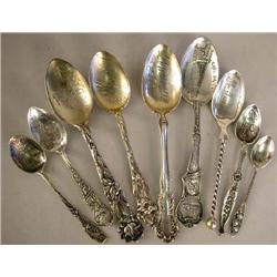 A GROUP OF TWENTY FIVE STERLING SILVER SOUVENIR SPOONS