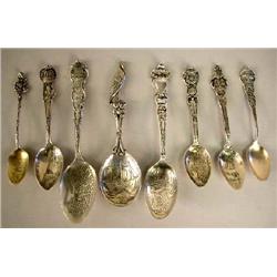 A GROUP OF TWENTY STERLING SILVER SOUVENIR SPOONS