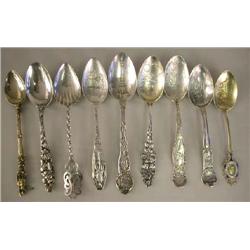A GROUP OF THIRTY STERLING SILVER SOUVENIR SPOONS