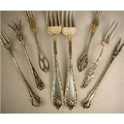 A GROUP OF STERLING SILVER FORKS