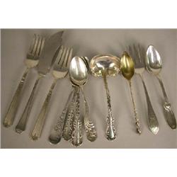 A GROUP OF ASSORTED STERLING SILVER FLATWARE