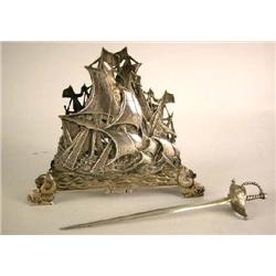 A DUTCH SILVER SHIP FORM LETTER HOLDER
