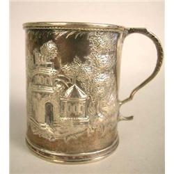 A SAMUEL KIRK (1828) AMERICAN SILVER MUG WITH ALL-OVER CHASED SCENIC DESIGN