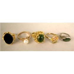 FIVE YELLOW GOLD RINGS
