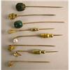 Image 1 : A GROUP OF EIGHT STICK PINS