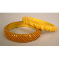 TWO GOLD COLOR BAKELITE BRACELETS