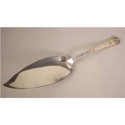A TIFFANY & CO. "WAVE EDGE" PATTERN (PAT. 1884) STERLING SILVER FISH SLICE