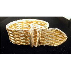 A MARIANNE OSTIER 18K YELLOW GOLD AND DIAMOND WOVEN BELT-FORM BRACELET