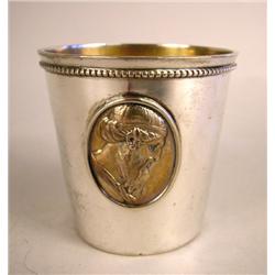 A TIFFANY & CO. STERLING SILVER CHILDS' CUP WITH OVAL MEDALLION