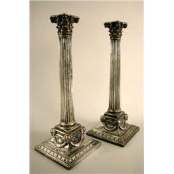 A PAIR OF ELKINGTON SILVER PLATED CANDLESTICKS