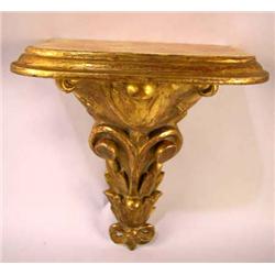 A SET OF FOUR ROCOCO STYLE CARVED PINE GILTWOOD WALL BRACKETS