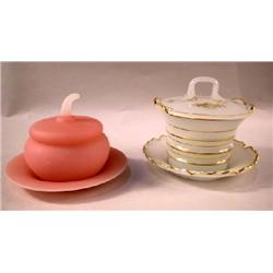 TWO COVERED GLASS JARS WITH UNDERPLATES