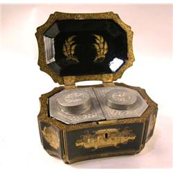 A PAPIER MACHE ORIENTAL SCENE GILT DECORATED TEA CADDY