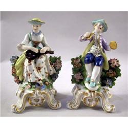 A PAIR OF CHELSEA PORCELAIN FIGURAL GROUPS