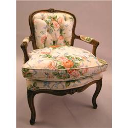 A LOUIS XV STYLE BEECHWOOD FAUTEUIL