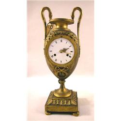 A CHARLES X ORMOLU GILT BRONZE MANTLE CLOCK