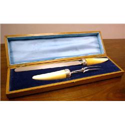 AN ENGLISH SILVER PLATE AND IVORY TOOTH-FORM CARVING SET