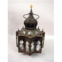 A PIERCED TOLE FACETED HANGING HALL LANTERN