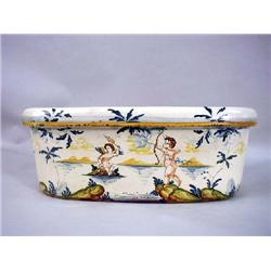 A TIN GLAZED EARTHENWARE JARDINIERE