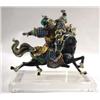 Image 1 : A CHINESE STYLE FIGURE ON HORSE BACK AND MOUNTED ON A LUCITE BASE.'