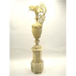 A LARGE ALABASTER EWER ON PEDESTAL