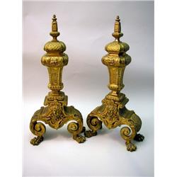 A PAIR OF BRONZE CHENETS