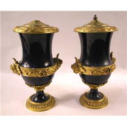 A PAIR OF COBALT AND GILT DECORATED ORMOLU MOUNTED COVERED URNS