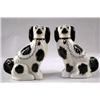 Image 1 : A PAIR OF BLACK AND IVORY STAFFORDSHIRE DOGS
