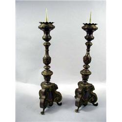 A PAIR OF BRASS BAROQUE STYLE PRICKET CANDLESTICKS