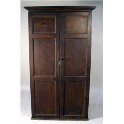 A BROWN STAINED PINE WALL CUPBOARD
