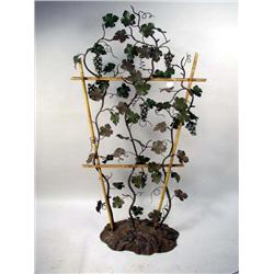 A POLYCHROME DECORATED TOLE GARNITURE