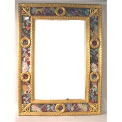 AN EGLOMISE GILTWOOD MIRROR