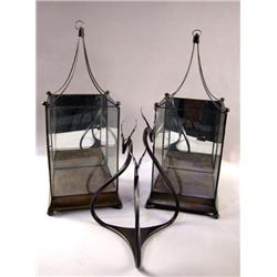 A PAIR OF STAINLESS STEEL MIRRORED-BACK HANGING LANTERNS