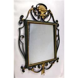 A GILT AND GREEN DECORATED IRON HANGING WALL MIRROR