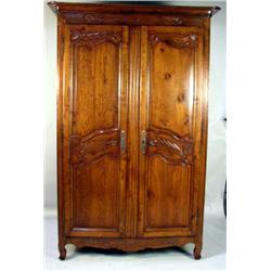 A LOUIS XV CARVED ARMOIRE